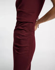 Dorothee Schumacher emotional essence dress dark burgundy on figure side detail