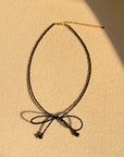 Hannan Gemstone Bow Necklace Black Spine