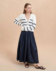 LA LIGNE mini marina cardigan navy and cream on figure front