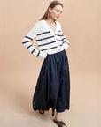 LA LIGNE mini marina cardigan navy and cream on figure side