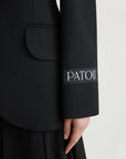 patou oversized belt jacket black on figure sleeve detail