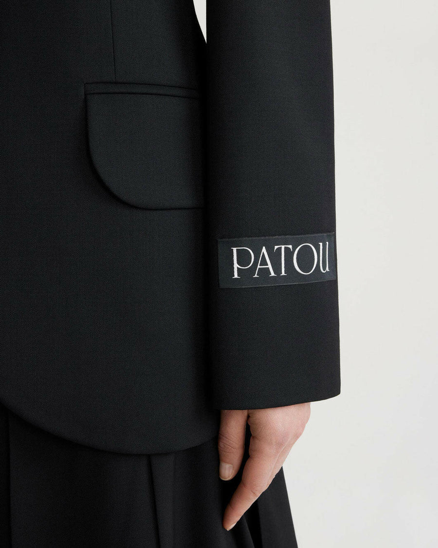 patou oversized belt jacket black on figure sleeve detail