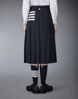 THOM BROWNE Below Knee Dropped Back Pleated Skirt Navy on figure back