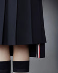 THOM BROWNE Below Knee Dropped Back Pleated Skirt Navy on figure front detail