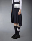 THOM BROWNE Below Knee Dropped Back Pleated Skirt Navy on figure side