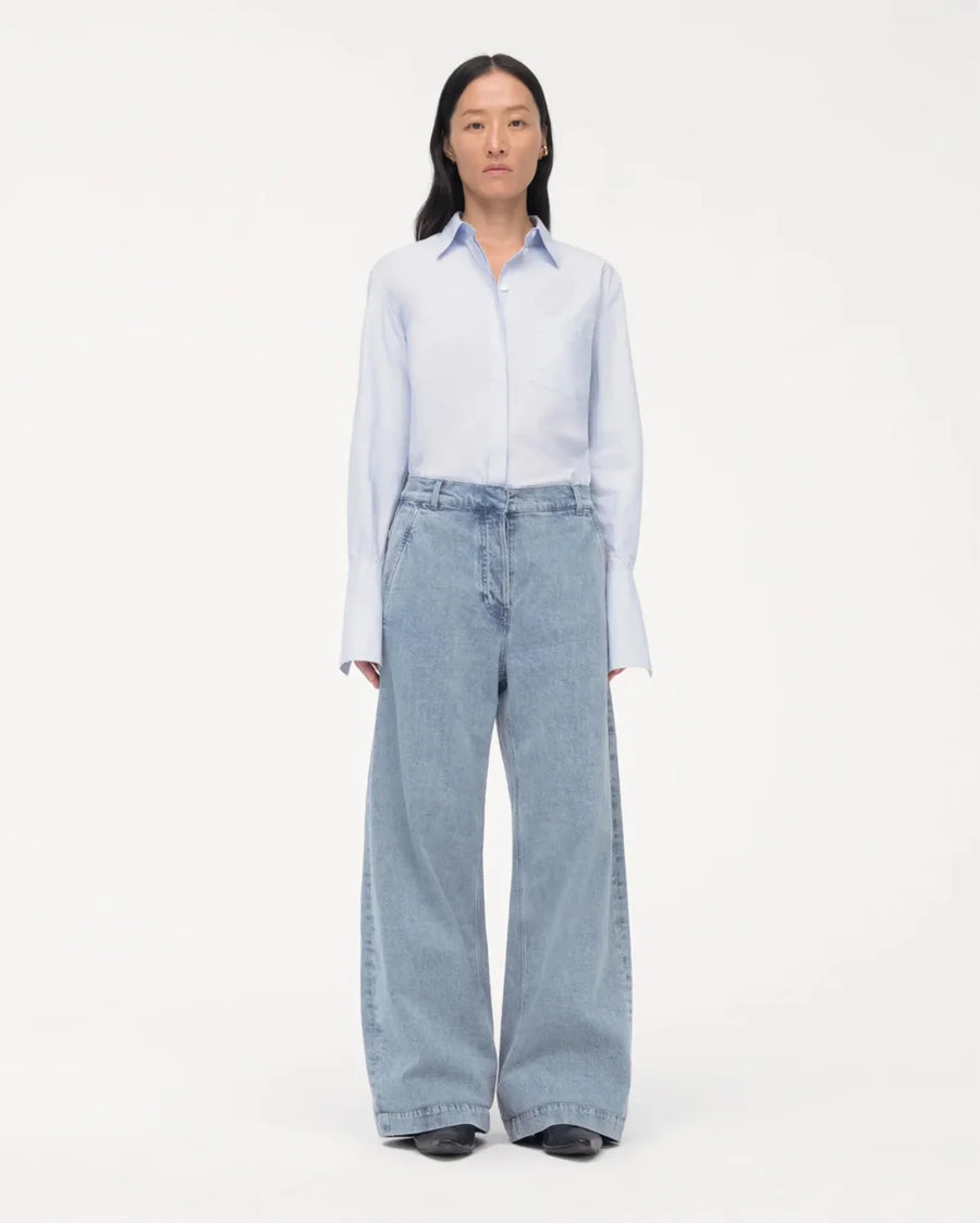 another tomorrow light wash Carpenter Denim Pant on figure front