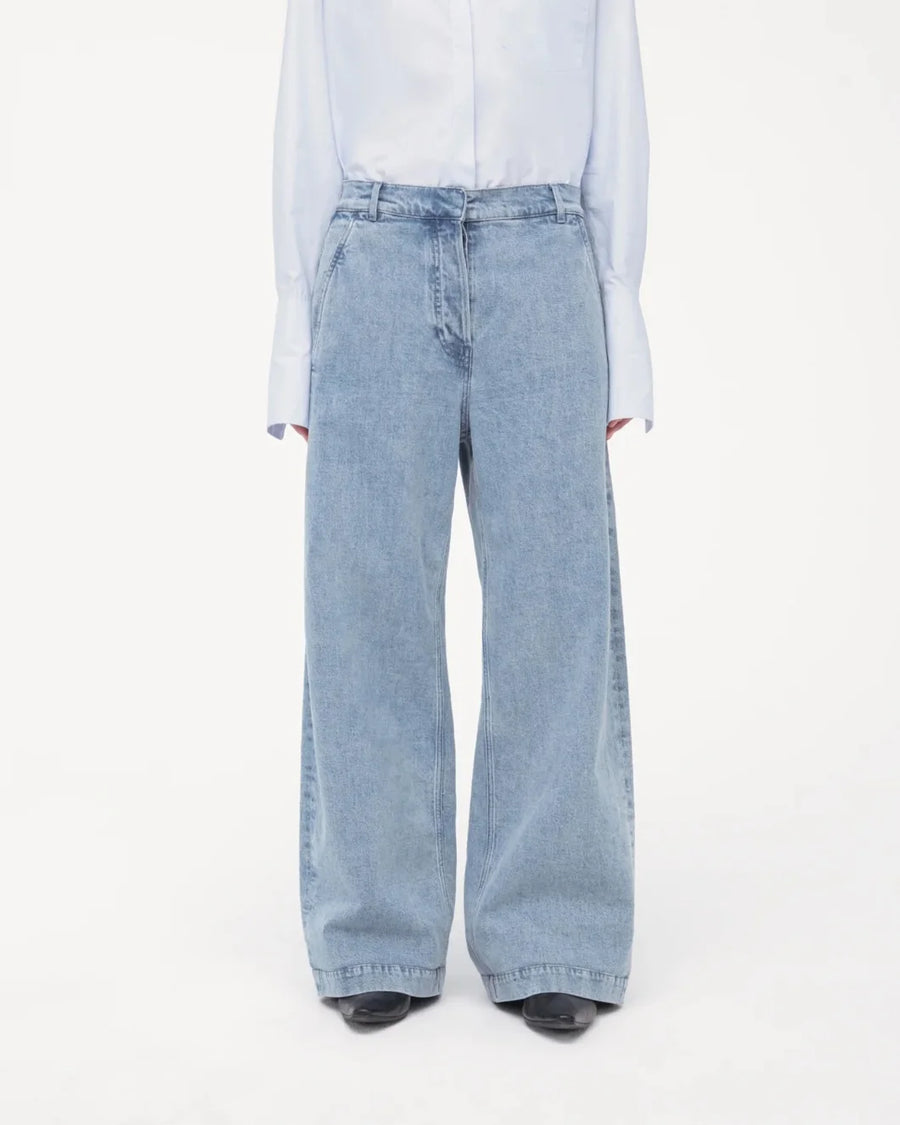 another tomorrow light wash Carpenter Denim Pant on figure front