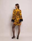 cara cara vida dress dusty gold fleur print on figure back