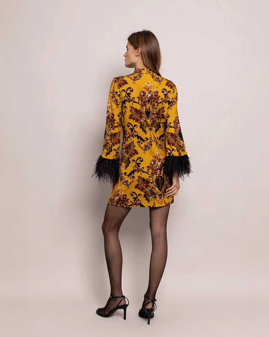 cara cara vida dress dusty gold fleur print on figure back