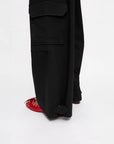 ganni black twill suiting cargo pants on figure side