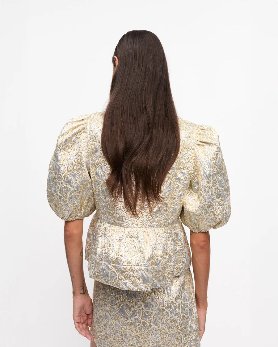 ganni Metallic Cloque Peplum Blouse gold and silver on figure back