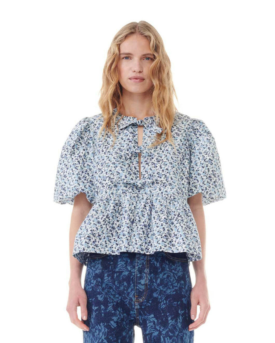 ganni floral printed cotton poplin peplum blouse glacier lake blue on figure front detial