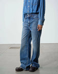 haikure tilda denim jumpsuit piano blue on figure side