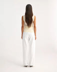 rohe Light Weight Spring Merino Wool Sleeveless Turtleneck cream on figure back