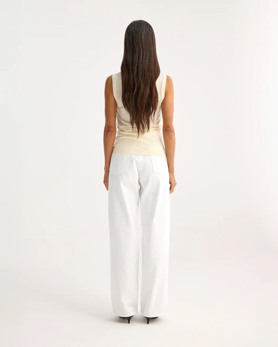 rohe Light Weight Spring Merino Wool Sleeveless Turtleneck cream on figure back