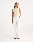 rohe Light Weight Spring Merino Wool Sleeveless Turtleneck cream on figure front