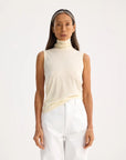 rohe Light Weight Spring Merino Wool Sleeveless Turtleneck cream on figure front