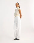 rohe Light Weight Spring Merino Wool Sleeveless Turtleneck cream on figure side