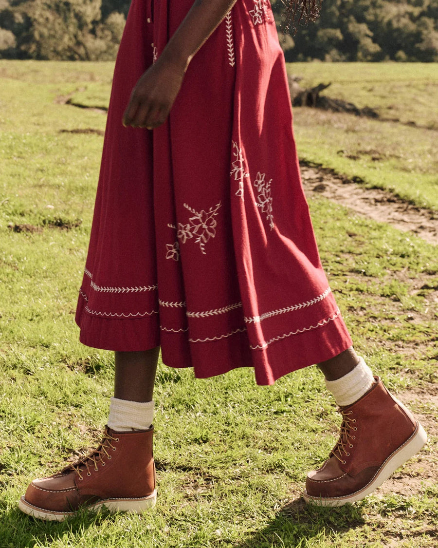 the great the bridge dress with hanky embroidered scarlet red on figure hem detail