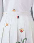 thom browne CLASSIC COTTON LINEN BOTANICAL FLOWER PLEATED SKIRT on figure back detail