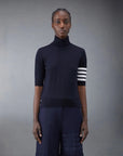 thom browne Fine Merino Wool 4-Bar Relaxed Fit Turtleneck navy on figure front