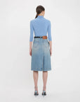 victoria beckham denim wrap detail skirt pale blue wash on figure back