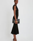 victoria beckham chain pouch with strap in black leather