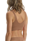 Back view of the beige bralette.
