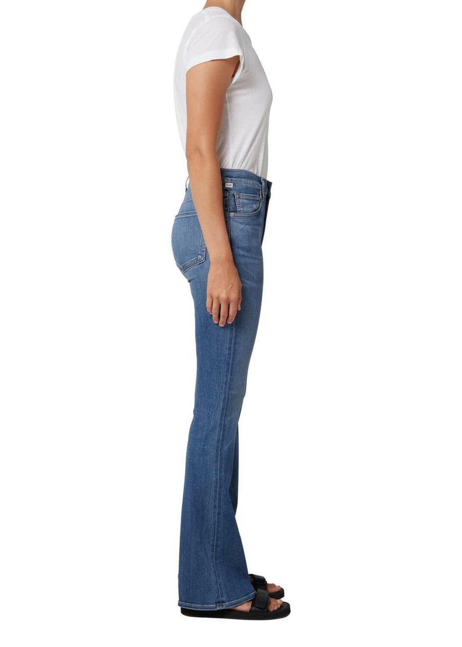 side view of emmanuelle low rise boot cut jeans, blue denim, on figure